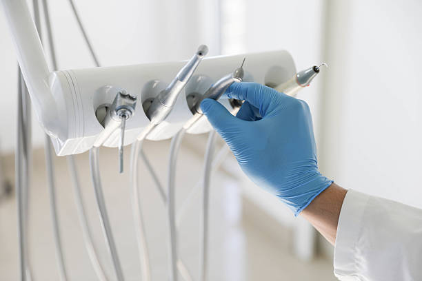 Professional Tooth Extraction technician working in Burlington, NC